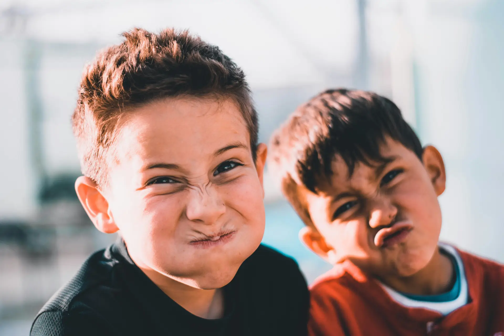 Two children making funny faces Two children making funny faces